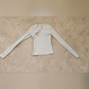New with tag on SKIMS long sleeve shirt